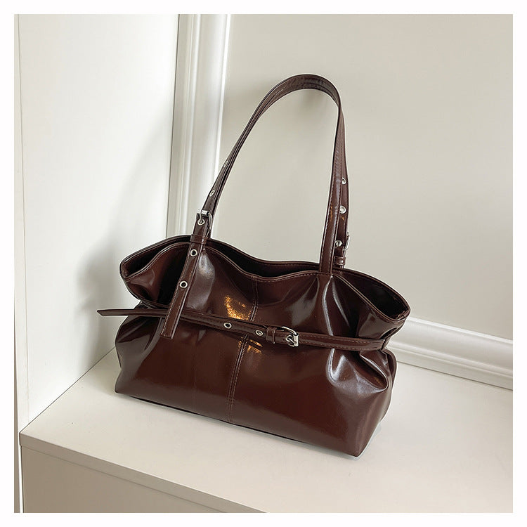 SAC PORTÉ ÉPAULE À BOUCLES EFFET CUIR BRILLANT